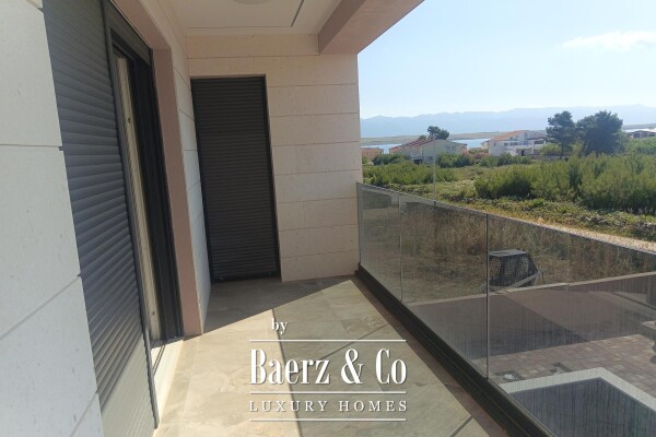 photo 5 Vir, Luxury villa with a pool in the first row to the sea